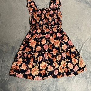 Floral dress with ruffle straps and a stretchy texture